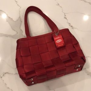 Red Harvey’s seat belt purse